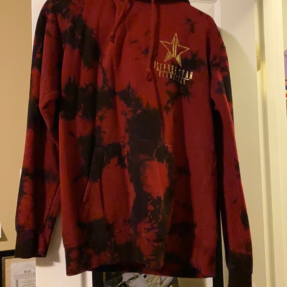 Tie dye black and red makeup artist Jeffree Star hoodie.